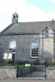 St Colme's Church - War Memorial is in the middle